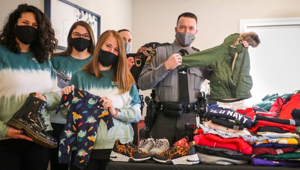 State Troopers Donate Bounty of Clothes Confiscated from Retail Theft Ring to Adoption Agency