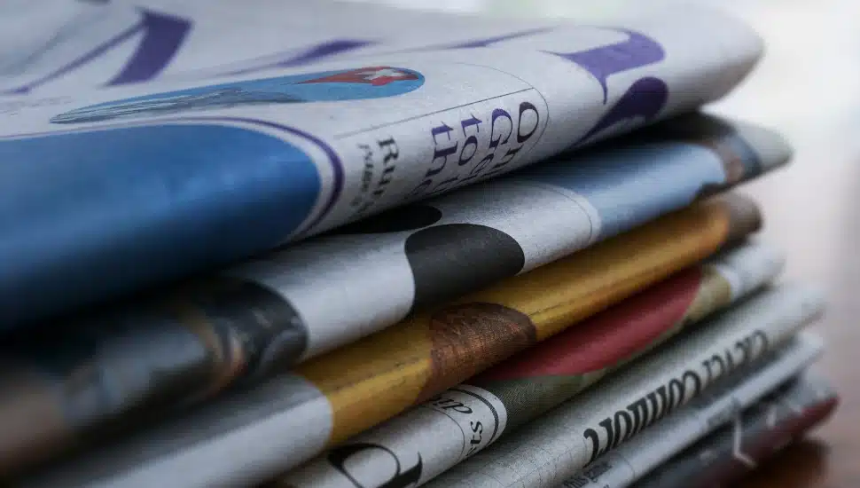 Stack of neatly folded Newspapers