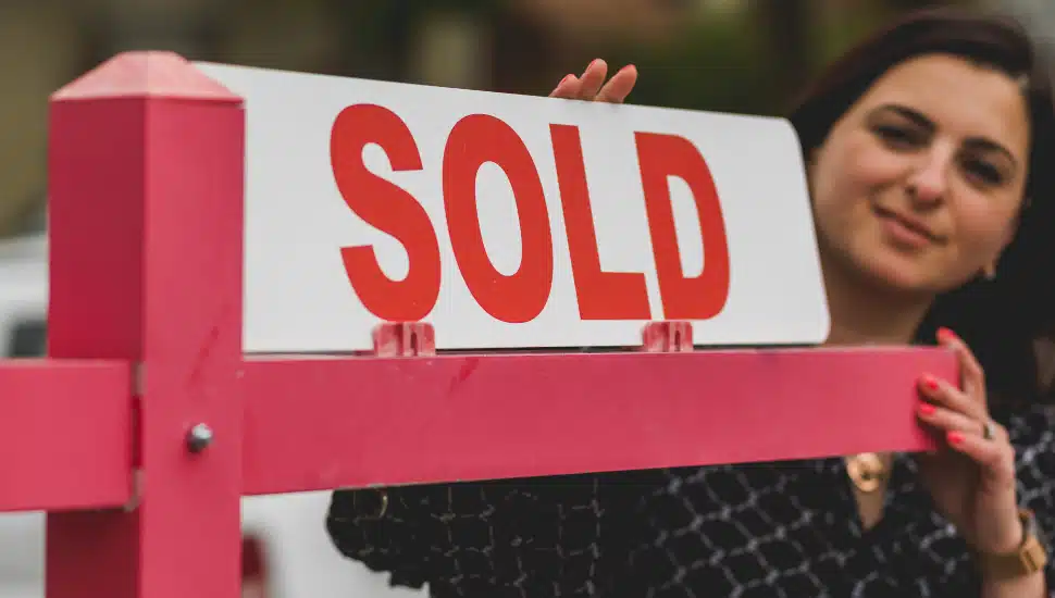 Sold Sign with Realtor
