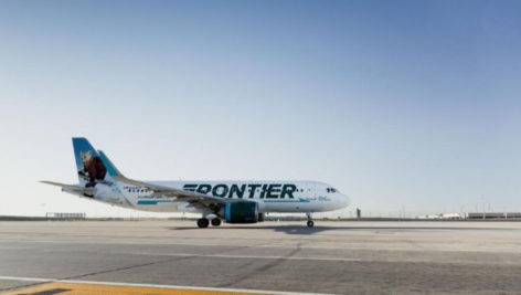 A Frontier Airline airplane gets ready to take off from the Philadelphia International Airport.
