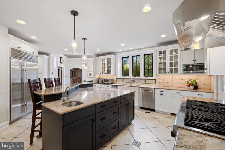 spacious mansion kitchen with seating