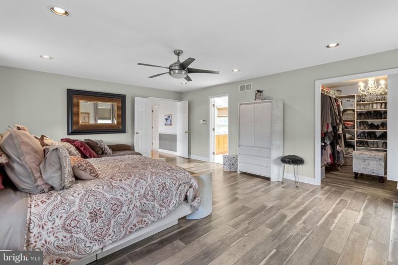 master bedroom with bed and closet