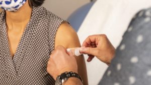 PA covid vaccine shot bandaid