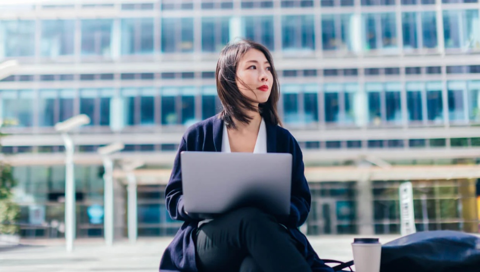 unisys woman on steps outside