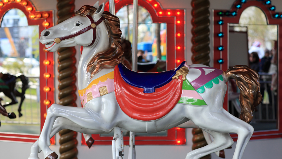 Colorful house on a carousel.
