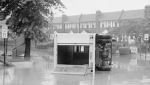 A new police rescue vehicle is on its side in floodwaters at Eyre Park in Chester back in 1971.