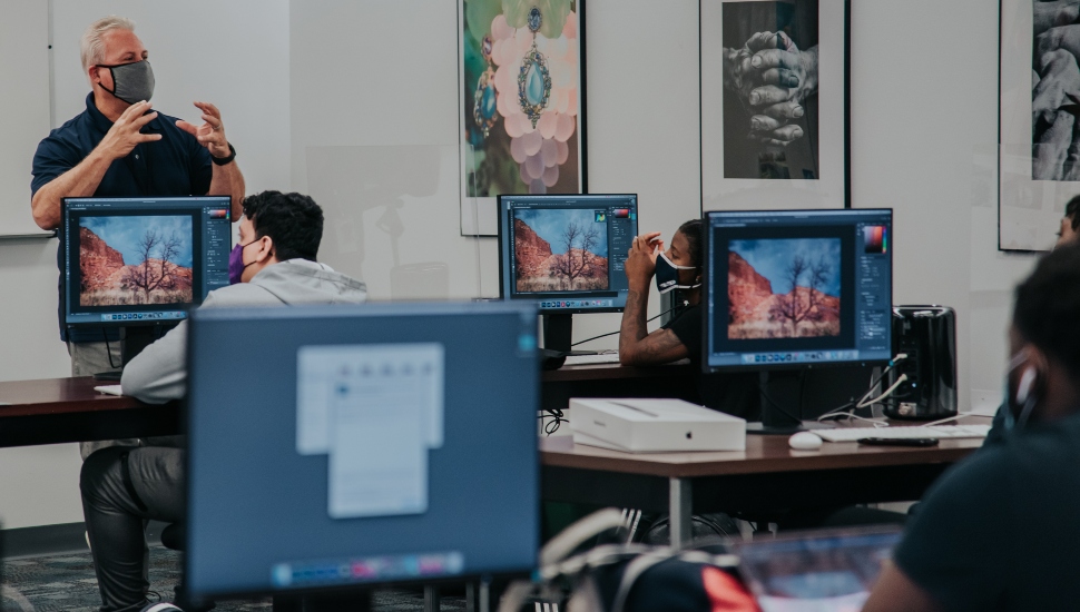 college professor teaching class