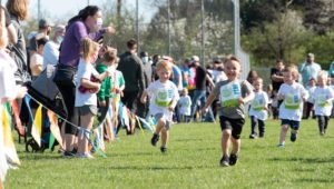 Little boys running in the Kids Running Series.