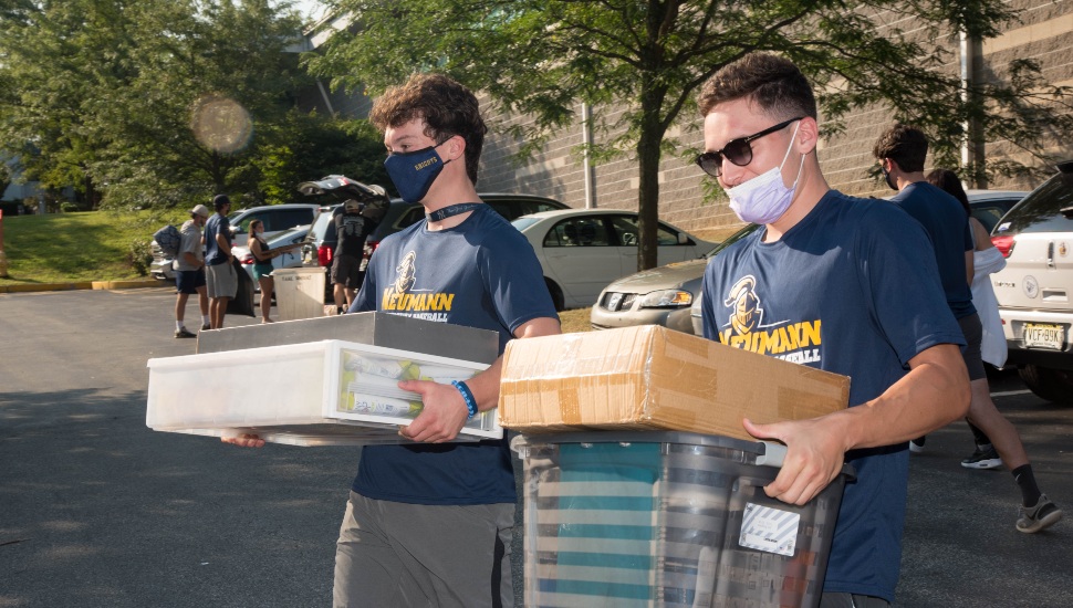 Neumann University students moving into dorms.