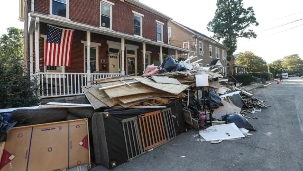 Debris piled in street after Hurricane Ida