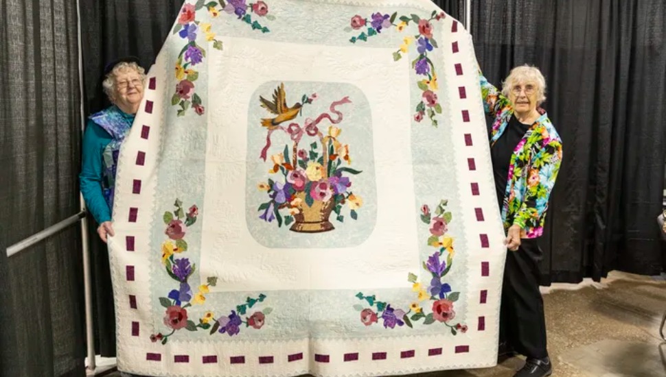 women at quilting extravaganza.