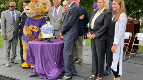 WCU Mascot Rammy Prepares to cut the official Anniversary Cupcake with President Fiorentino.
