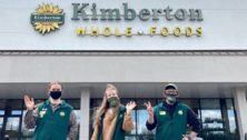 Supermarket employees in front of Kimberton Whole Foods store.