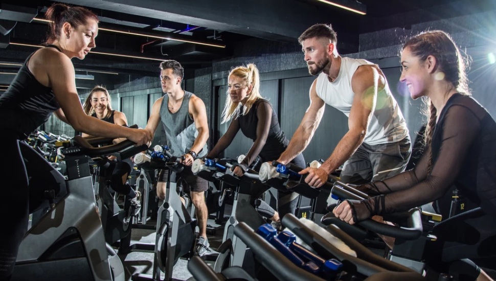 People riding stationary bikes at DASH Fitness Studio in Pottstown.