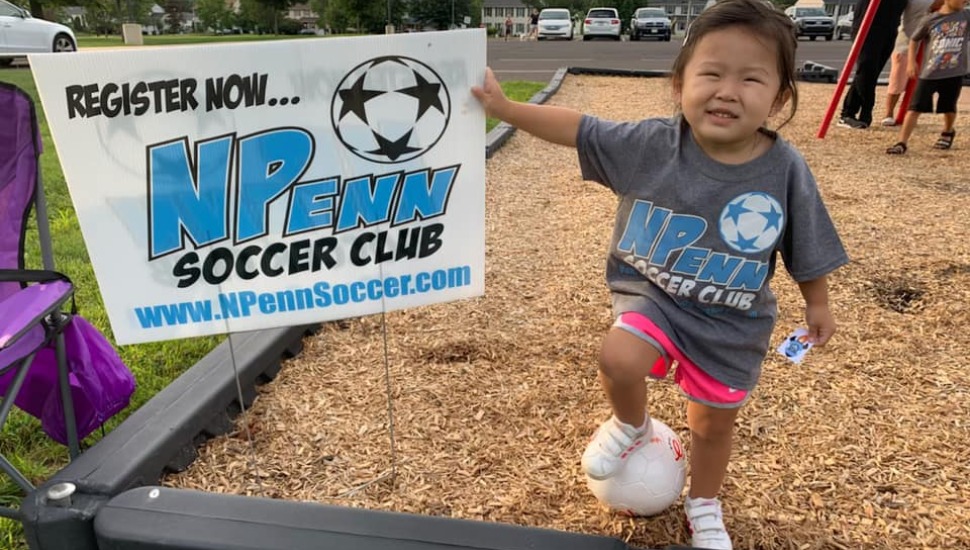 young child ready to play soccer