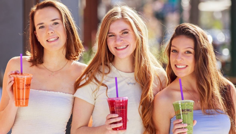Three girls with drinks in the Philadelphia suburbs.
