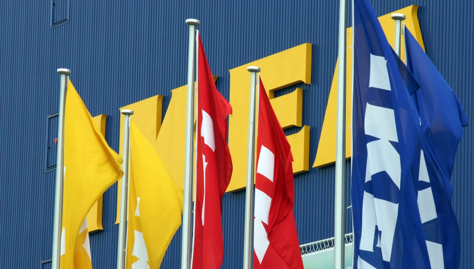 blue building yellow logo flags