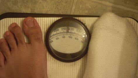 obesity feet on scale