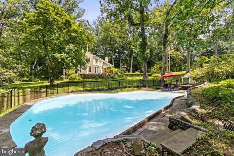 Classic Colonial with pool in the backyard
