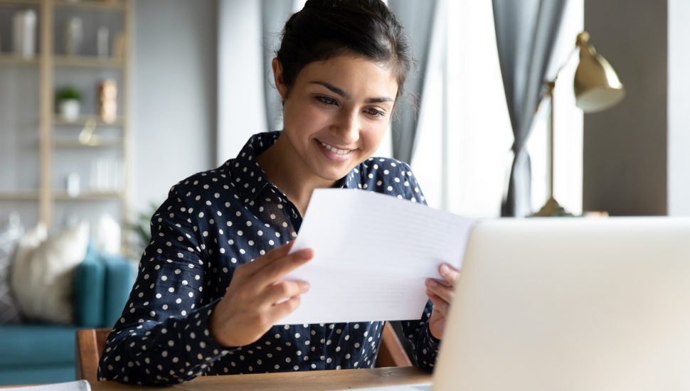 Woman reading a job offer.