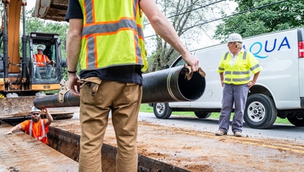 utility workers installing water pipes