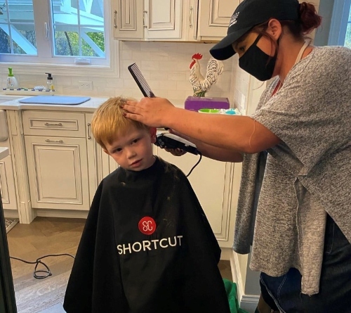 Child getting in-home haircut with shortcut. Image via Facebook.