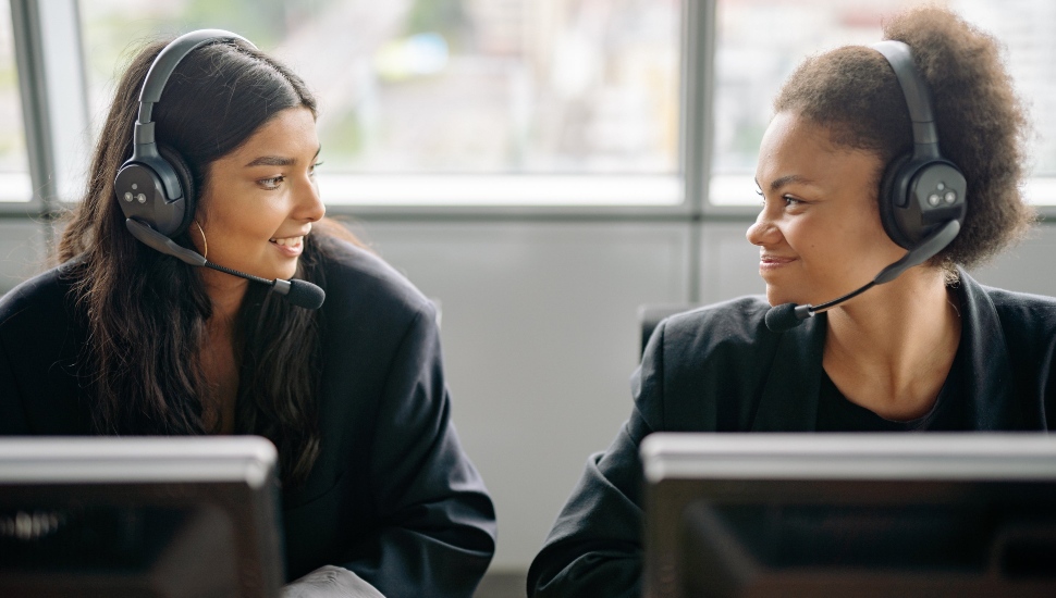Two telemarketers enjoying a moment together.