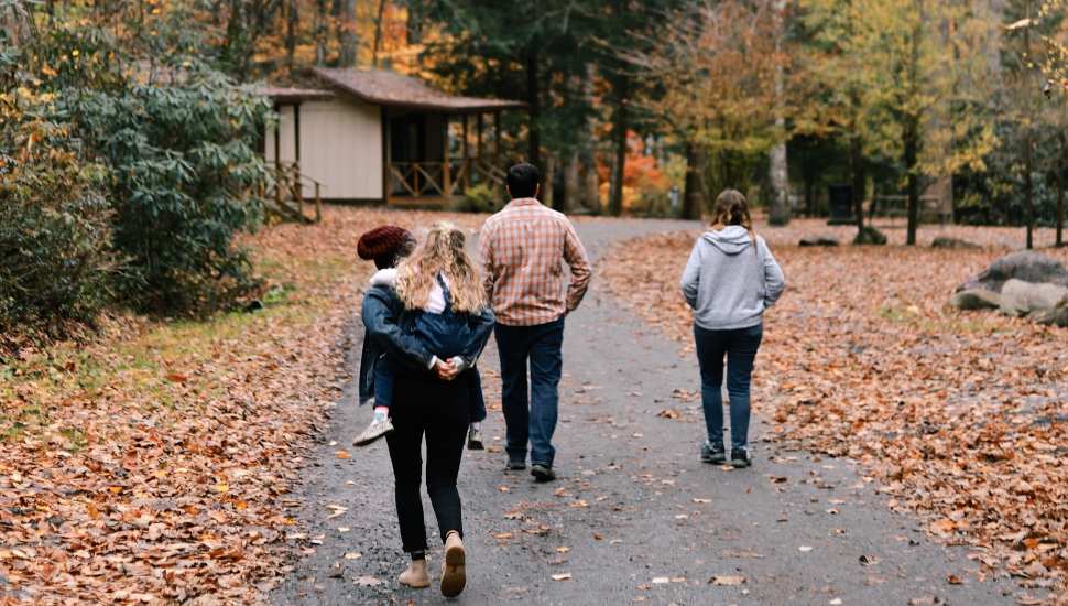 people walking a trail