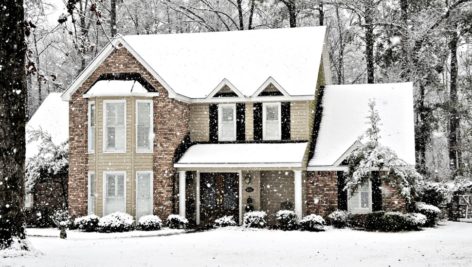 house in winter snow