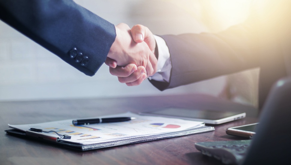 two men shaking hands
