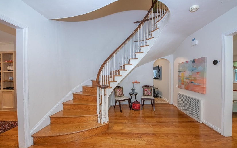 curved staircase in wynnewood house