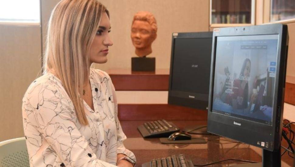college student at computer