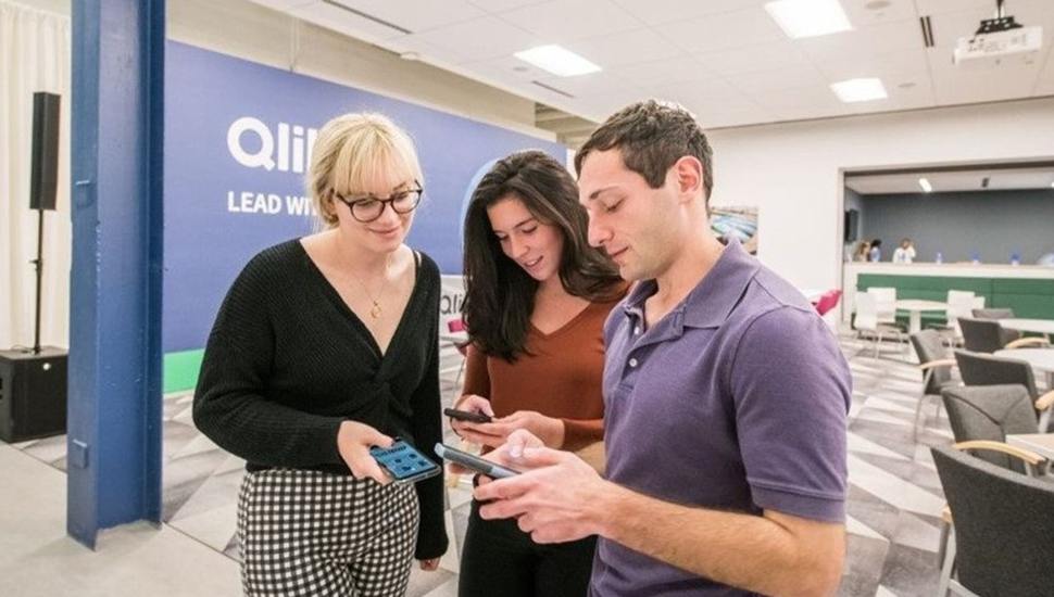 millennials looking at cell phone