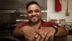 smell the curry - Juby George, owner