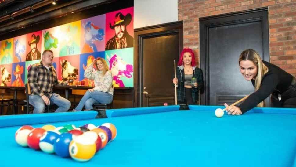 woman at pool table