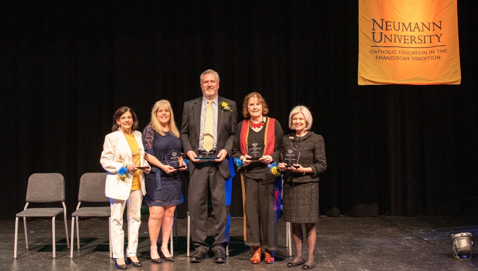 Delco residents Sandra Weiss, Annette Hargadon, Michael Kaczenski, Helen Kain, and Nancy Costello received alumni awards from Neumann University on March 8.