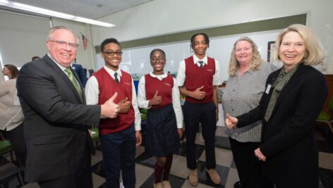 Chris Domes, Drexel Neumann Academy students, Barbara Brennan and Mary Domes.