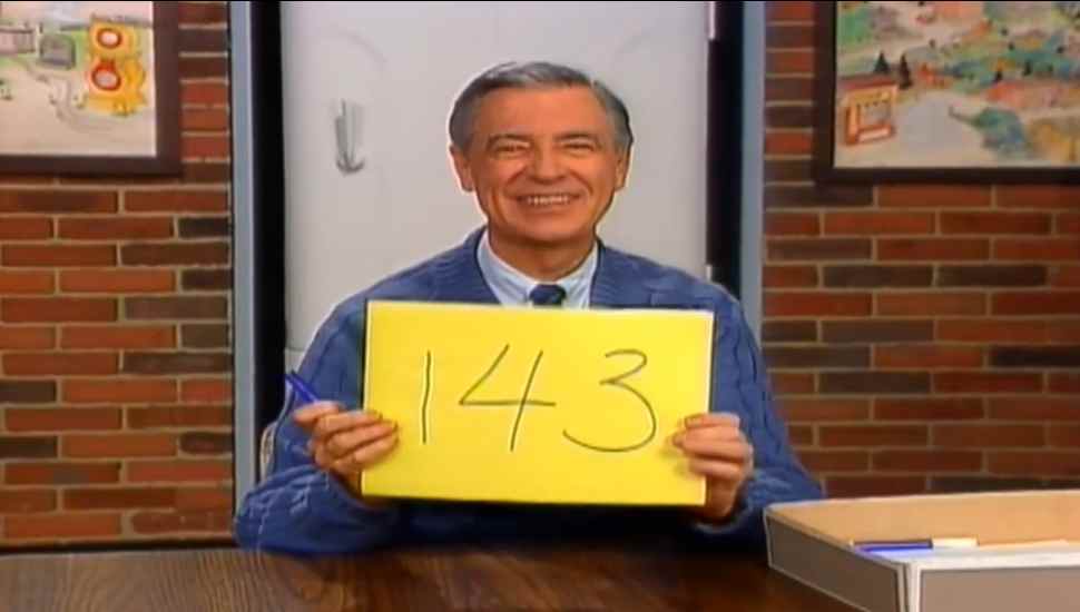man with yellow sign