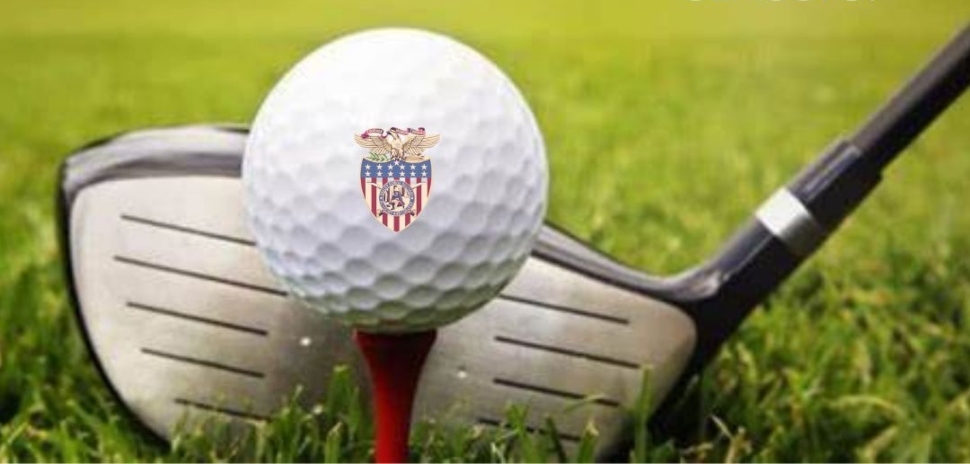 Golf club hitting a golf ball with the Valley Forge Military Academy and College logo.
