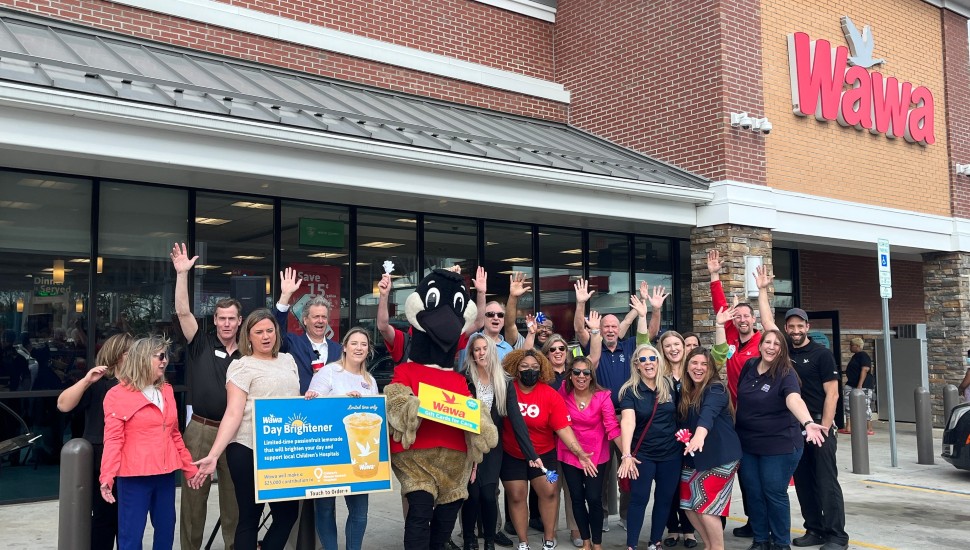 A group outside of a Wawa store on Wawa Day.