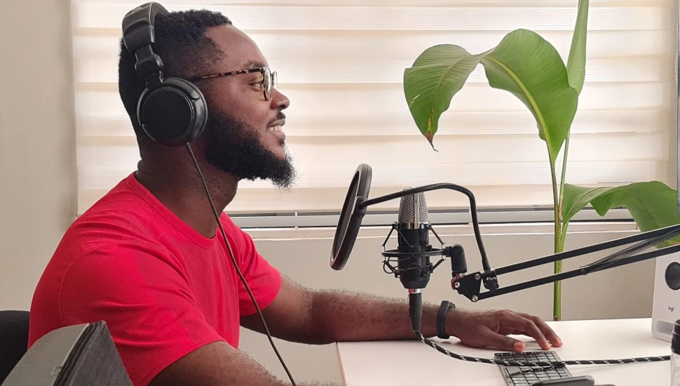 man at radio station