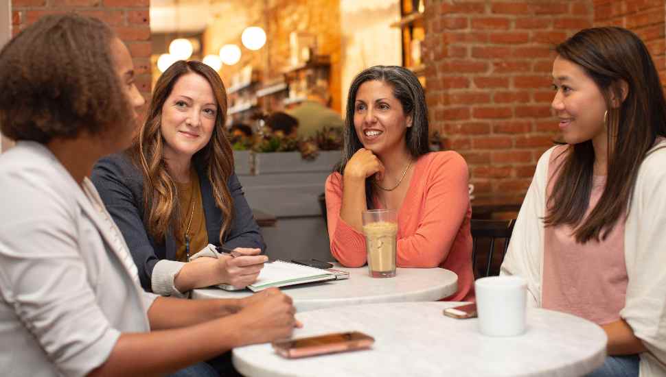 women around a table