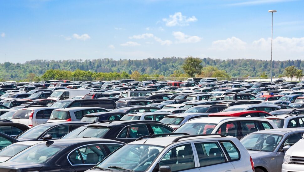 A parking lot packed with vehicles.
