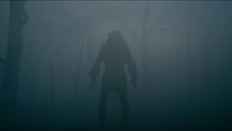alien figure in the fog