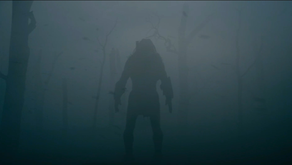 alien figure in the fog