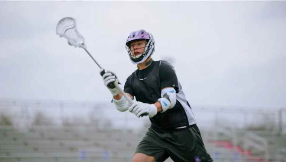 athlete with stick