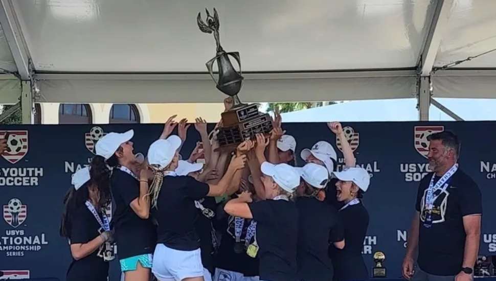 girls with trophy