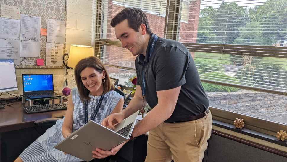 man and woman with laptop