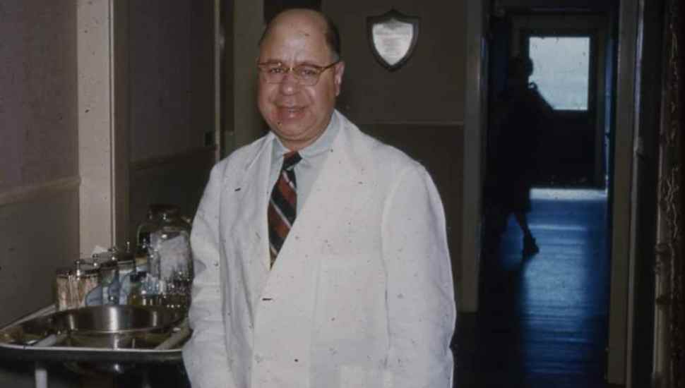 man in white coat