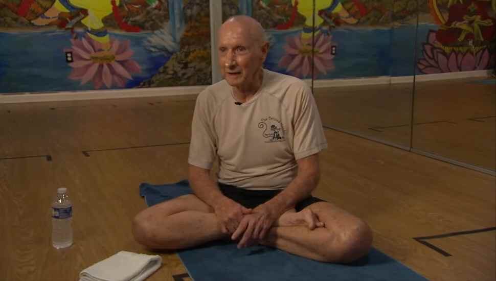 man sitting cross-legged